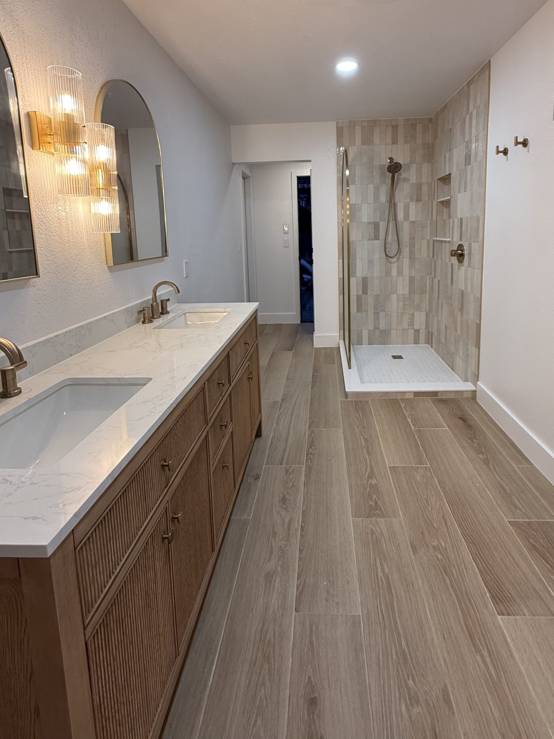 Remodeled bathroom in San Antonio TX with contemporary design and upgraded fixtures